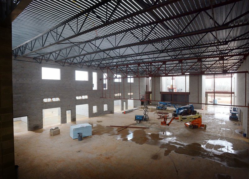 Construction is shown underway in January in the commons area at the Osage Creek Elementary and Creekside Middle schools in Bentonville.