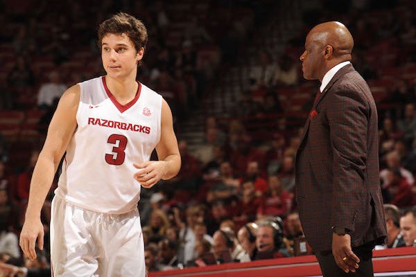 Arkansas coach Mike Anderson speaks with Dusty Hannahs against Missouri Saturday, Jan. 14, 2017, during the second half in Bud Walton Arena.