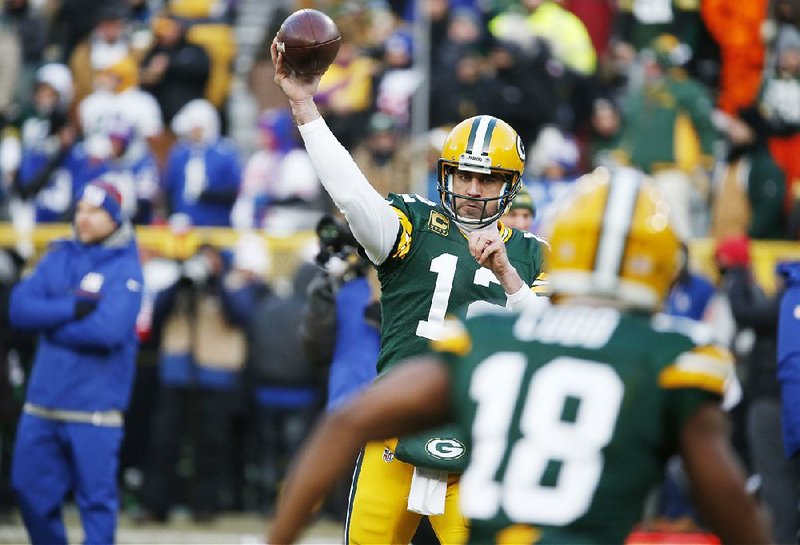 In Green Bay’s 30-16 loss to Dallas in October, the Packers’ Aaron Rodgers completed 31 of 42 passes for 294 yards and a touchdown. Dallas’ Dak Prescott threw for three touchdowns.