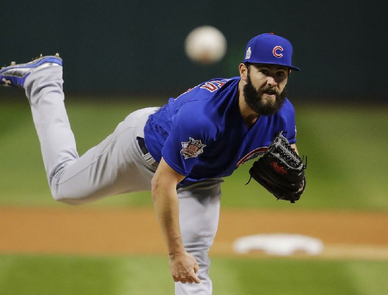  In this Oct. 26, 2016, file photo, Chicago Cubs starting pitcher Jake Arrieta throws during the first inning of Game 2 of the Major League Baseball World Series against the Cleveland Indians, in Cleveland. 