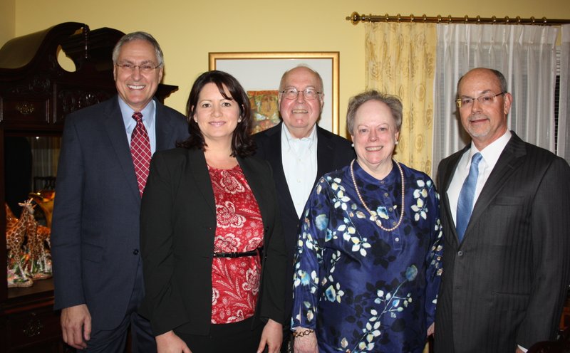 UAMS Chancellor Dr. Dan Rahn (from left), Pearl McElfish, UAMS NW vice chancellor, Reed and Mary Ann Greenwood and UA President Don Bobbitt gather at a reception at the Reeds’ home to celebrate the 10th anniversary of the medical school’s Northwest Arkansas campus.