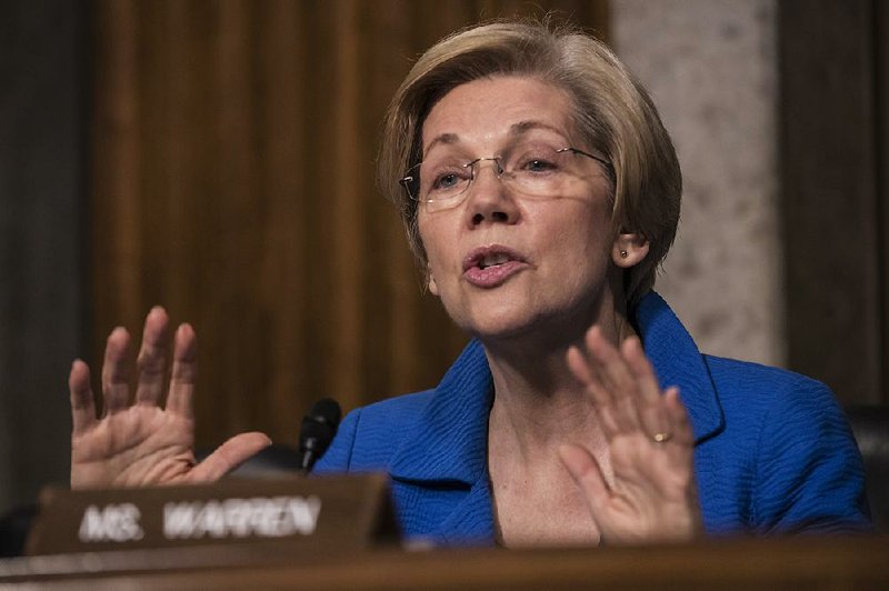 In a Thursday, Jan. 12, 2017 file photo, Senate Armed Services Committee member Sen. Elizabeth Warren, D-Mass. questions Defense Secretary-designate James Mattis on Capitol Hill in Washington, during the committee's confirmation hearing for Mattis. 