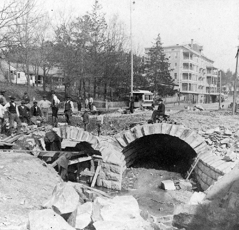 Workers pose where two branches of the Hot Springs Creek tunnel come together during construction in 1884, when the structure was known as “Hamblen’s arch.” 