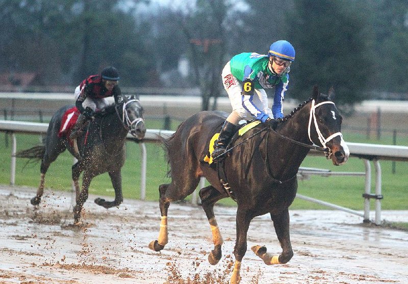 Jockey Channing Hill and Uncontested ease up after crossing the finish line to win the $150,000 Smarty Jones Stakes on Monday at Oaklawn Park in Hot Springs. Uncontested jumped out to an early lead and won by 51/4 lengths over second-place finisher Petrov and nearly 10 lengths over Rowdy the Warrior, who finished third.