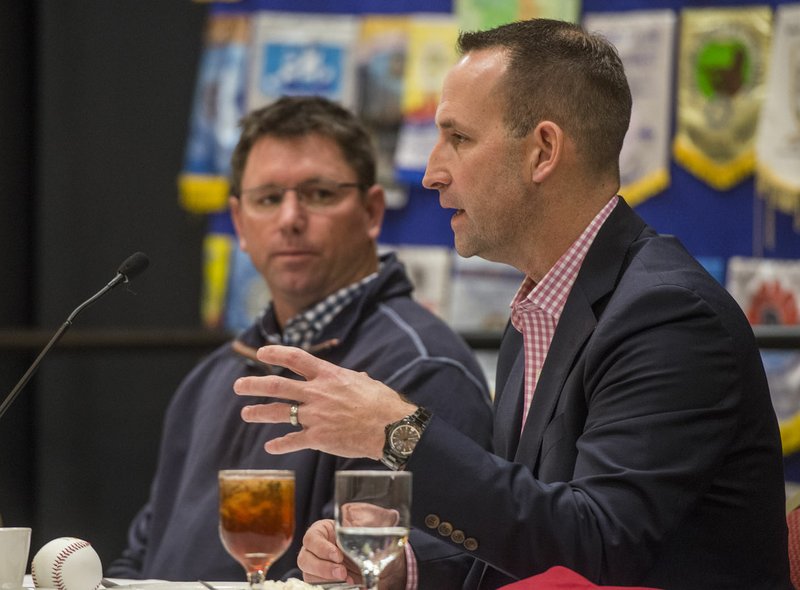 Scott Sharp, the Kansas City Royals’ assistant general manager of Baseball Operations, talks Monday as Northwest Arkansas manager Vance Wilson looks on during the Northwest Arkansas Naturals Hot Stove Luncheon hosted by Springdale Rotary at the Springdale Holiday Inn Convention Center.