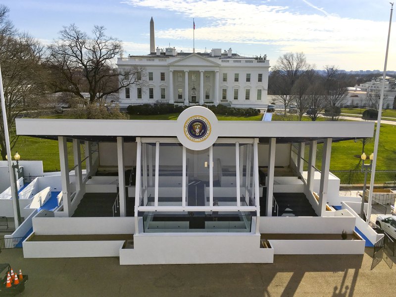 The inaugural parade presidential reviewing stand on Pennsylvania Avenue in front of the White House, Sunday, Jan. 15, 2017, is nearly completed in preparation for the 58th presidential inauguration, on Friday, Jan. 20. 