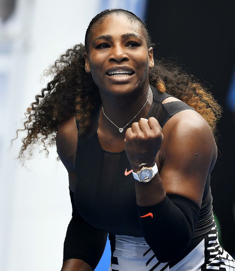 United States' Serena Williams celebrates after defeating Switzerland's Belinda Bencic during their first round match at the Australian Open tennis championships in Melbourne, Australia, Tuesday, Jan. 17, 2017.