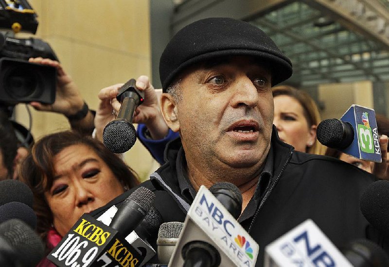 Al Salman, uncle of Noor Salman, the widow of the Orlando nightclub gunman, speaks Tuesday outside a federal courthouse in Oakland, Calif.