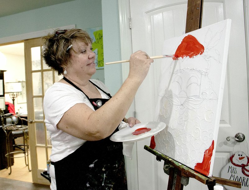 LYNN KUTTER ENTERPRISE-LEADER Temple Moore, a retired art teacher with Prairie Grove School District, has opened a new shop downtown called The Creative Fix. The back room of the shop is being used for her art projects and to provide art classes.
