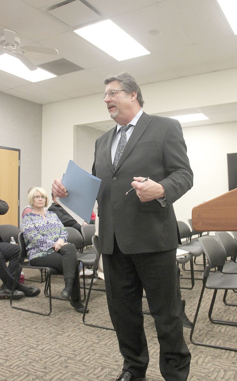 LYNN KUTTER ENTERPRISE-LEADER Farmington City Attorney Steve Tennant addresses several residents who have expressed concerns about two houses on Double Springs Road. Tennant gave an update on the two properties at the Jan. 9 Farmington City Council meeting.