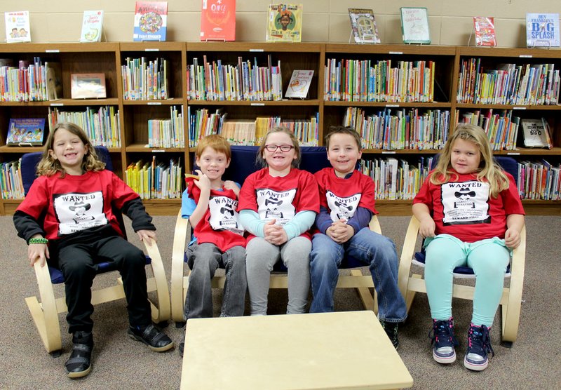 Photo by Zane Vanderpool January PAWS (&#8220;Pawsitive&#8221; and Wise Students) winners at Glenn Duffy Elementary School were recognized at last week&#8217;s Rise and Shine assembly and presented T-shirts sponsored by the Glenn Duffy PTO. PAWS winners for this month are (left to right) Evan Cowdrey of Bella Vista, Anthony Smart of Gravette, Brilee Gilbert of Gravette, Colton Priebe of Gravette and Bailey Cooper of Gravette. Gianna Smith of Bella Vista was not present for the photo.
