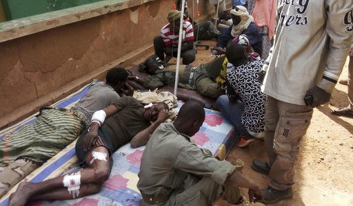 Wounded Malian troops receive medical treatment after being injured by an explosion at the Joint Operational Mechanism base in Gao, Mali, on Wednesday, Jan. 18, 2017. 