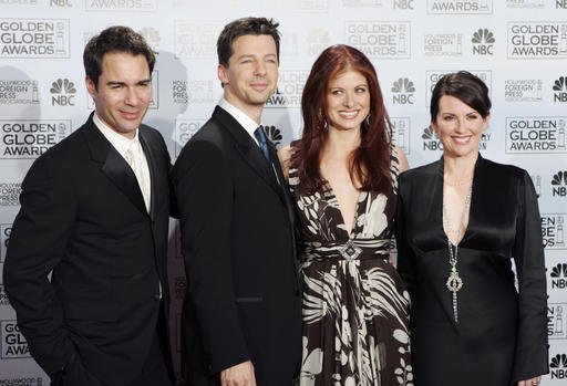 In this Jan. 16, 2006, file photo, cast members from the comedy series "Will & Grace," from left, Eric McCormack, Sean Hayes, Debra Messing and Megan Mullally, pose backstage after making an award presentation at the 63rd Annual Golden Globe Awards in Beverly Hills, Calif. 