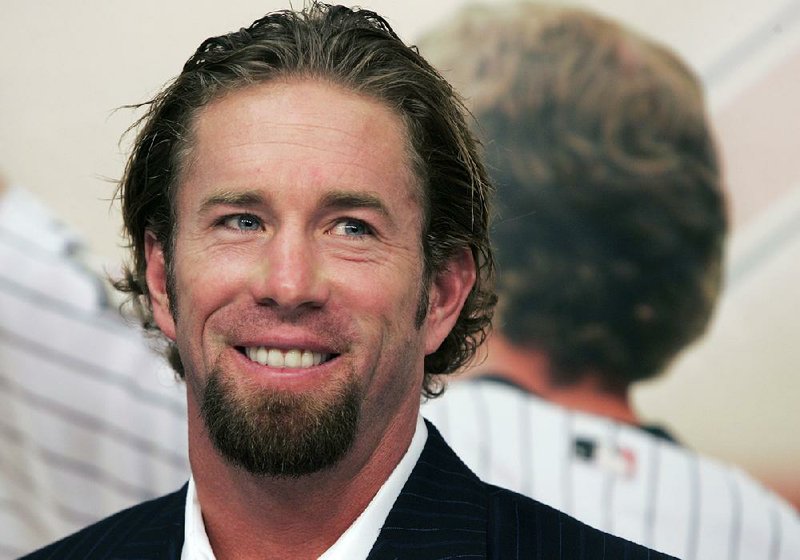 In this Dec. 15, 2006, file photo, Houston Astros long time first baseman and four-time All-Star Jeff Bagwell announces his retirement from baseball in Houston. 