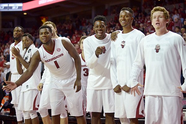 Arkansas basketball players celebrate during a game against Texas-Arlington on Friday, Nov. 18, 2016, in Fayetteville. 