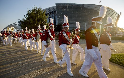 The Razorback Band marches outside on Saturday, Sept. 24, 2016, before the game against Texas A&M at AT&T Stadium in Arlington, Texas.