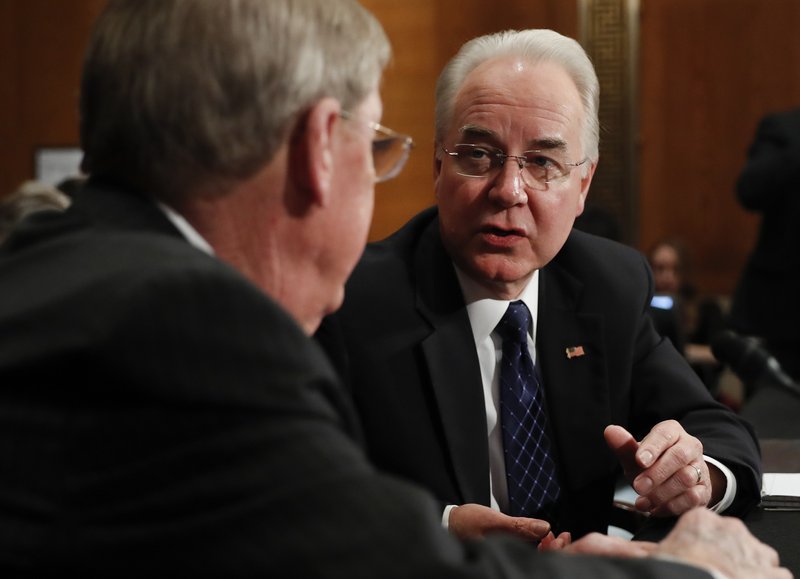 Health and Human Services Secretary-designate, Rep. Tom Price, R-Ga., right, talks with Sen. Johnny Isakson, R-Ga. on Capitol Hill in Washington, Wednesday, Jan. 18, 2017, prior to the start of Price's confirmation hearing before the Senate Health, Education, Labor and Pensions Committee.