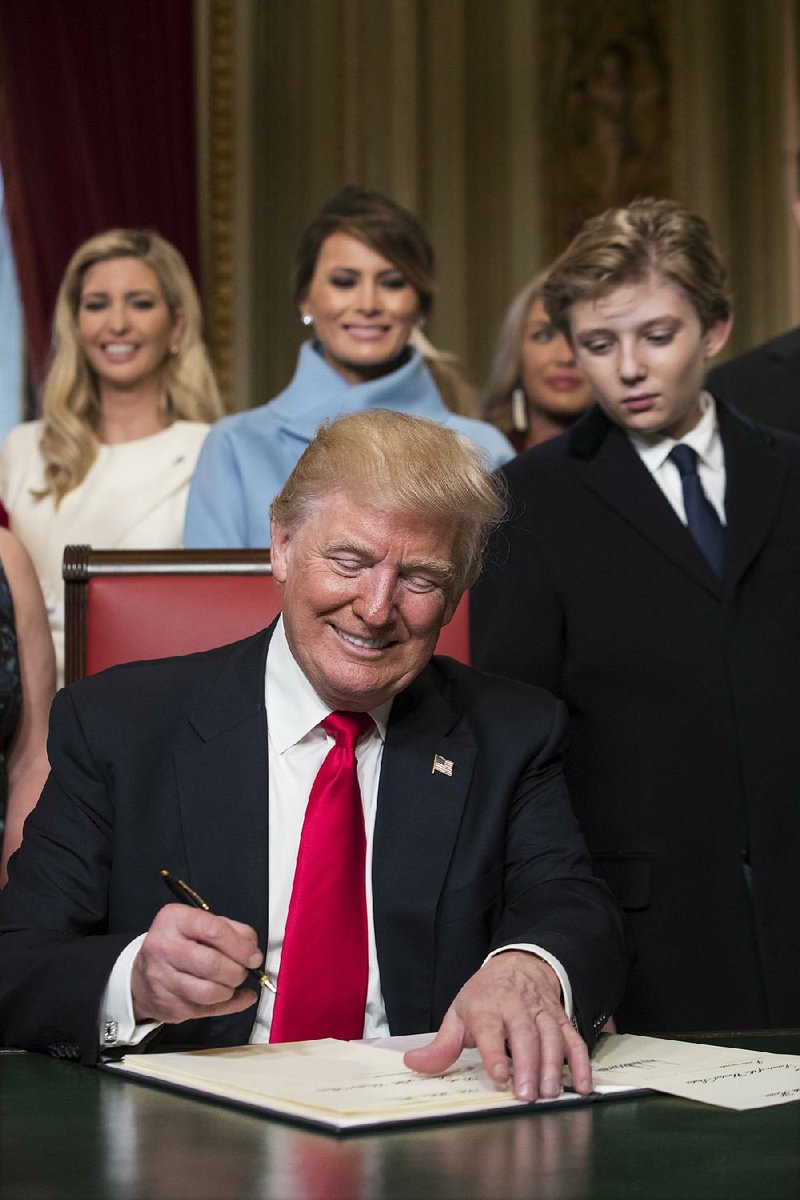 Surrounded by family members, President Donald Trump formally nominates his Cabinet and other members of his administration.