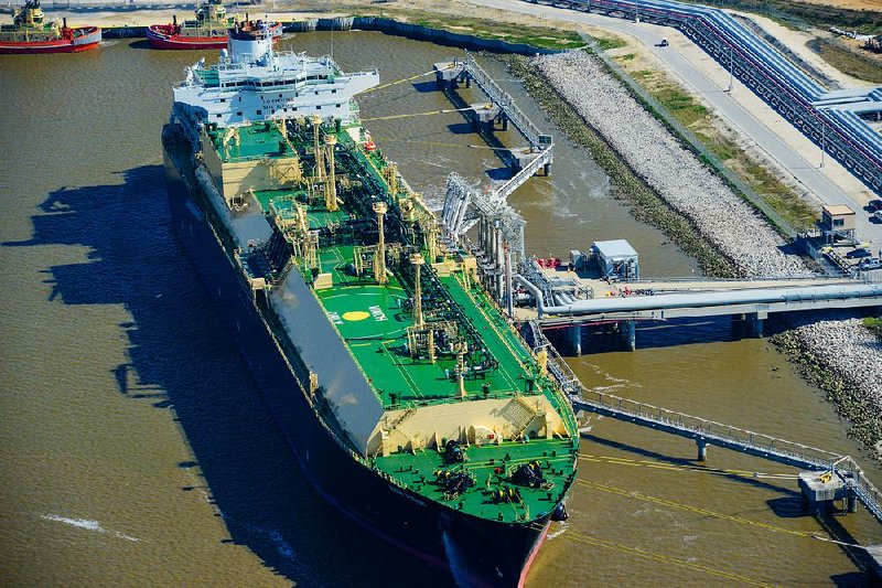 The Asia Vision liquefied natural gas carrier ship, bound for Brazil, sits docked at the Cheniere Energy Inc. terminal in Sabine Pass, Texas, in February.