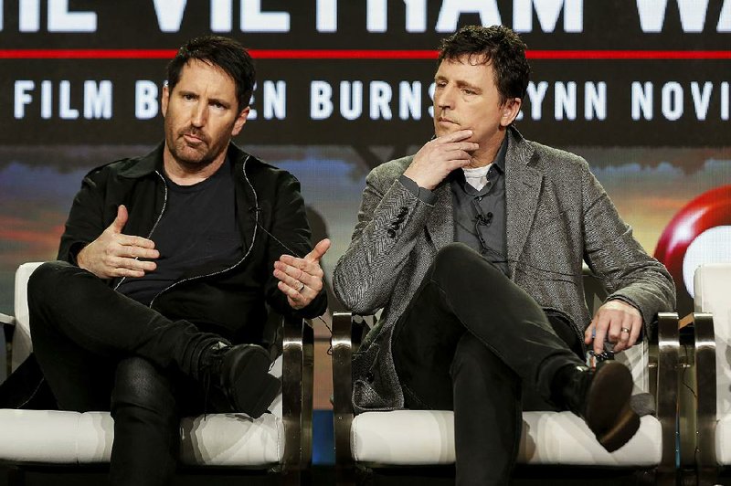 Trent Reznor (left) and Atticus Ross speak at PBS’ The Vietnam War panel at the Television Critics Association press tour on Jan. 15.