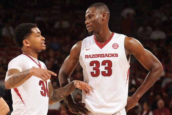 Moses Kinglsey (33) of Arkansas speaks with Anton Beard against LSU Saturday, Jan. 21, 2017, during the second half of play in Bud Walton Arena. Visit nwadg.com/photos to see more photographs from the game.