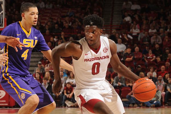 Jaylen Barford (0) of Arkansas drives around Skylar Mays of LSU Saturday, Jan. 21, 2017, during the second half of play in Bud Walton Arena. Visit nwadg.com/photos to see more photographs from the game.