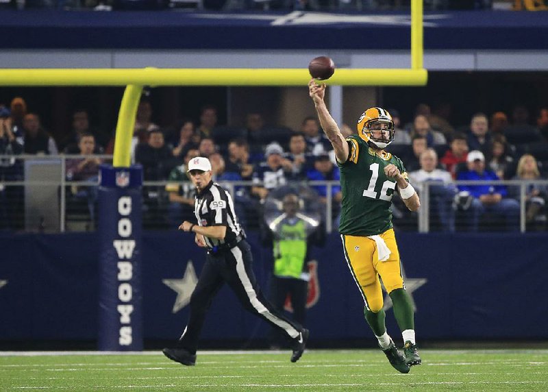 Green Bay quarterback Aaron Rodgers admits there is a lot of noise in the Georgia Dome. He just wonders if it
is all natural.