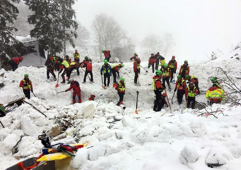 Rescuers continue Saturday to hunt for survivors in the avalanche-destroyed Rigopiano Hotel in central Italy. 