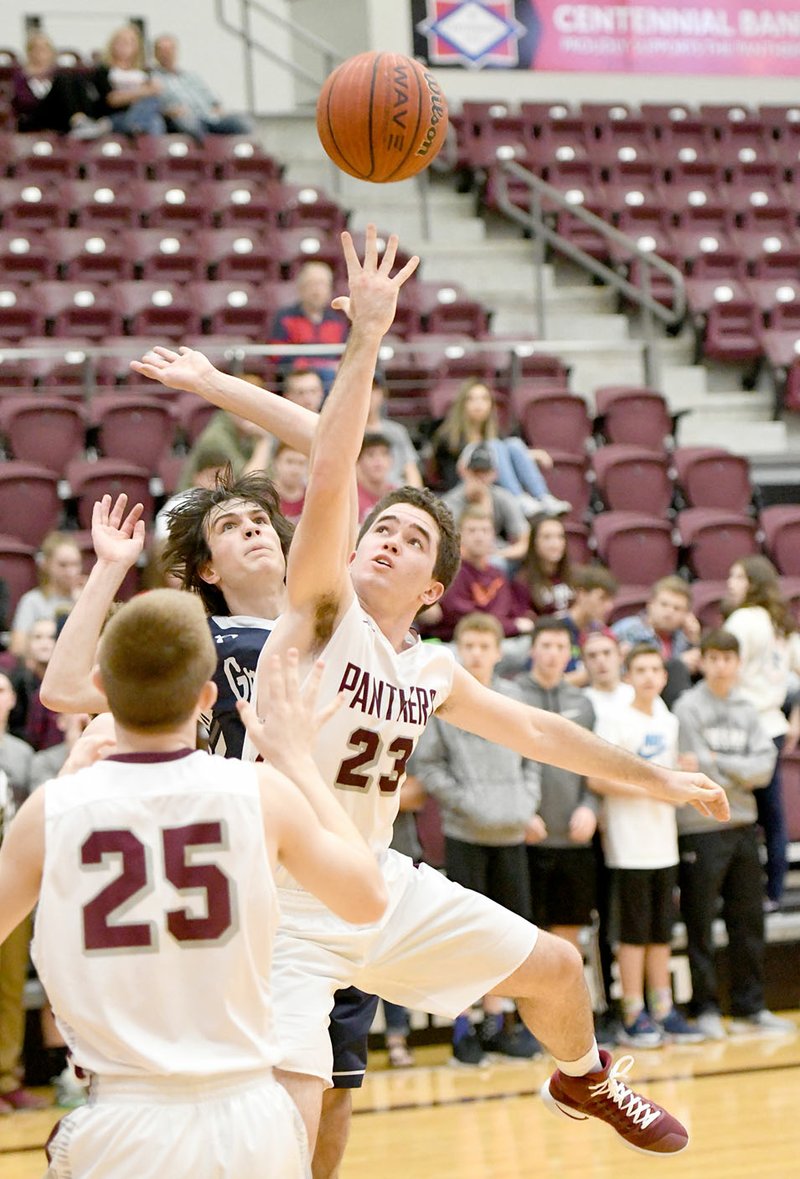 Bud Sullins/Special to Siloam Sunday Siloam Springs junior Spencer Lashley takes an off-balanced shot Friday against Greenwood at Panther Activity Center. Lashley scored 13 points as the Panthers defeated Greenwood 57-48.