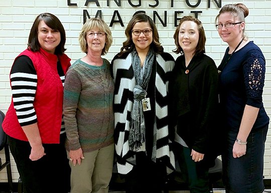 Submitted photo Langston Aerospace and Environmental Studies Magnet School Principal Taryn Echols, center, congratulated teachers who were recently awarded $4,950 in new grants. Science facilitator Trina Burden, second from right, received a $3,000 grant from Henderson State University's STEM Center for science materials. Library media specialist Ronda Hughes, left, was awarded $1,250 from the Around the Clock Coding Grant provided by the Arkansas Computer Science Initiative. Computer lab manager Carolyn Boyette, second from left, received a $1,000 Read Across America Library Grant for projects in the library. Kindergarten teacher Katrenia Bledsoe, right, was awarded a $700 Target Field Trip Grant for learning opportunities outside of the classroom.