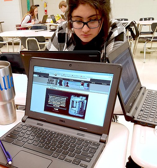 Submitted photo Ecuadorean exchange student Janisse Aguirre and her classmates in Jessica Cornell's English 11 class at Magnet Cove High School researched African-American authors Harriet Jacobs, Phillis Wheatley and Frederick Douglass for a web quest assignment.