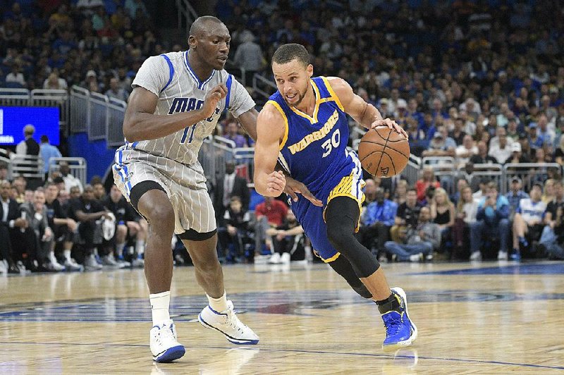 Golden State Warriors guard Stephen Curry (30) hit seven three-pointers en route to a 27-point performance in Sunday’s 118-98 victory over the Orlando Magic.