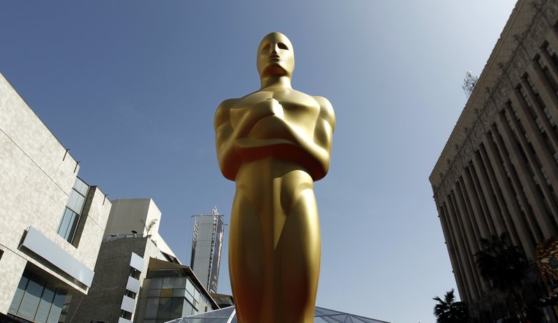FILE - This Feb. 26, 2012 file photo shows an Oscar statue on the red carpet before the 84th Academy Awards in Los Angeles. Nominees for the 89th Academy Awards will be announced on Tuesday, Jan. 24, 2017.. (AP Photo/Matt Sayles, File)