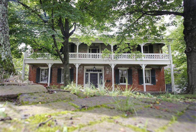 The Walker-Stone House, located at 207 W. Center Street in Fayetteville.