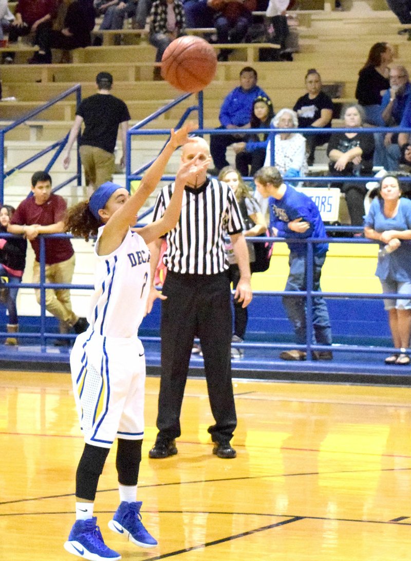 Photo by Mike Eckels Decatur&#8217;s Desi Meek puts up a free-throw during the Lady Bulldogs&#8217;-Lady Saints&#8217; basketball contest at Peterson Gym in Decatur Jan. 20. Meek&#8217;s shot in the final 30 seconds put the game out of reach for St. Paul and helped give Decatur its first district win of the season.