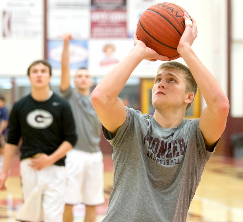 Photo by Jason Ivester Gentry senior Austin Morris warms up on Tuesday, Jan. 3, before the game against Haas Hall at Gentry High School.