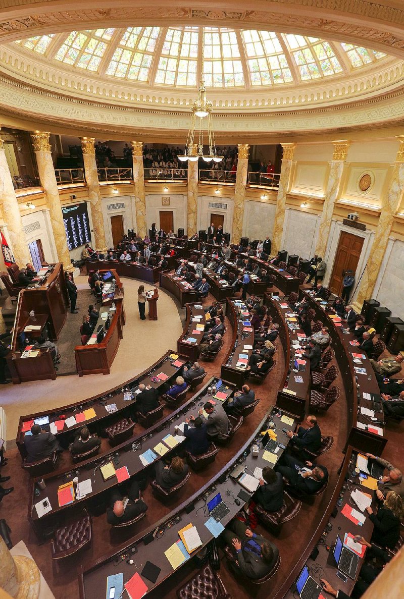 Representatives fill the state House chamber Wednesday during legislative activity.