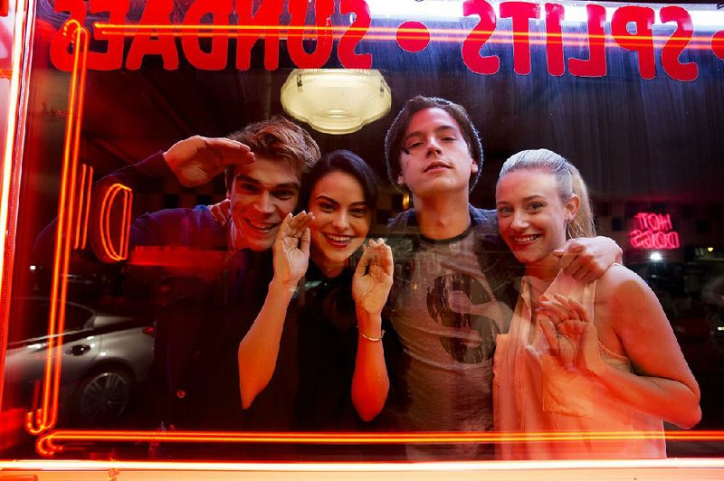 Riverdale, a new teen drama from The CW, stars (from left) K.J. Apa, Camila Mendes, Cole Sprouse and Lili Reinhart as Archie, Veronica, Jughead and Betty.
