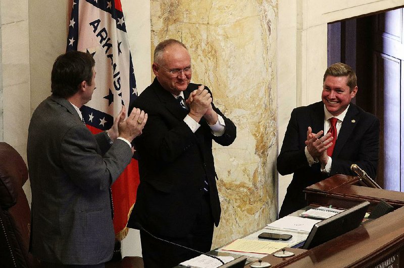 House Parliamentarian Buddy Johnson (center) gets a round of applause from the House in honor of his birthday, which is today.