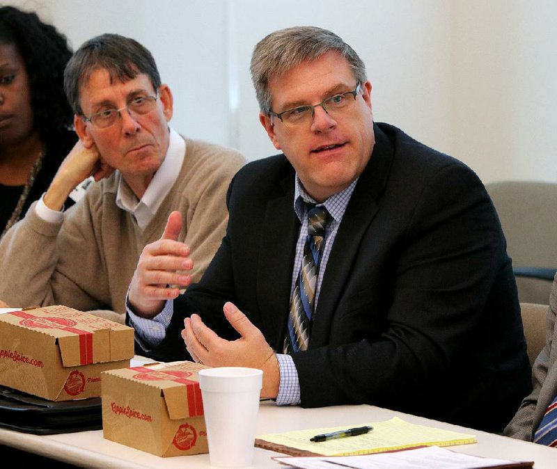 Tom Masseau (right), Disability Rights’ executive director and a member of the joint juvenile justice panel, is shown in this file photo.