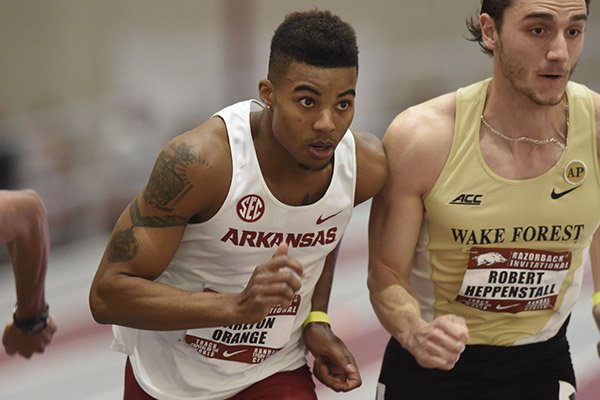 Arkansas runner Carlton Orange and Robert Heppenstall from Wake Forest battle for position off the starting line as they begin the men's 800 meter run Saturday, Jan. 28, 2017, at the Razorback Invitational track meet at the Randal Tyson Track Center in Fayetteville. Orange finished 3rd with a time of 1:47.78.