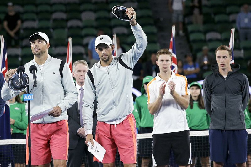 American twin brothers Bob (left) and Mike Bryan have won 16 Grand Slam titles in men’s doubles, but they lost in the Australian Open final Saturday.