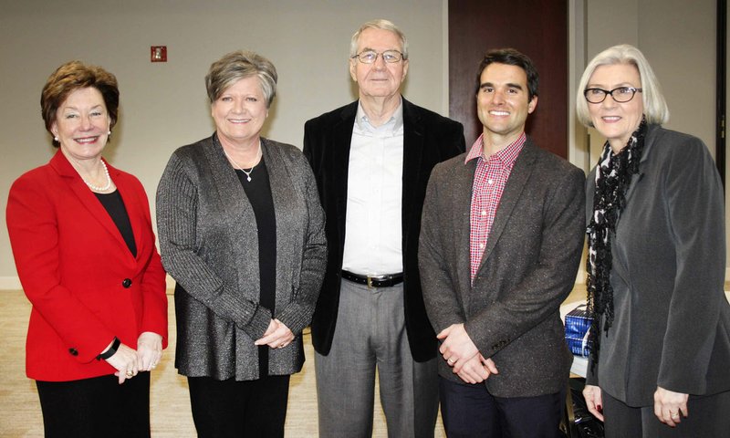 NWA Democrat-Gazette/CARIN SCHOPPMEYER Susan Keating (from left), Charlotte and Mike Robards, Alden Napier and Ann Estes gather at a reception in honor of Robards and Napier on Jan. 19 at The Jones Center in Springdale.