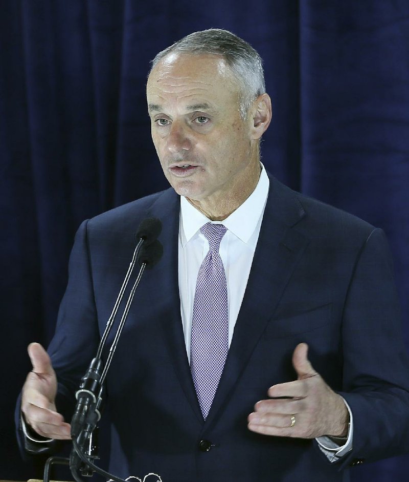 Major League Baseball commissioner Rob Manfred gestures during a press conference where he announced that the Cleveland Indians would host the 90th All-Star Game in 2019 at Progressive Field in Cleveland, Friday, Jan. 27, 2017. 