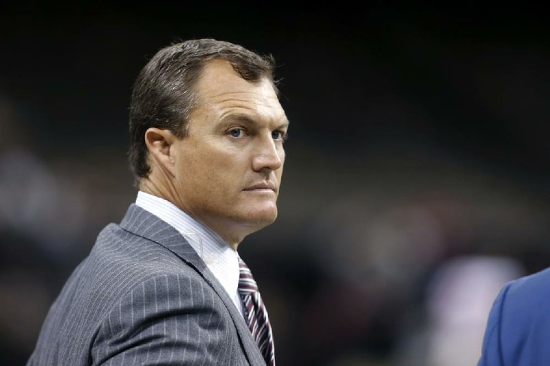 This Nov. 9, 2014 photo shows former NFL player John Lynch on the sideline before an NFL football game between the New Orleans Saints and the San Francisco 49ers in New Orleans. 