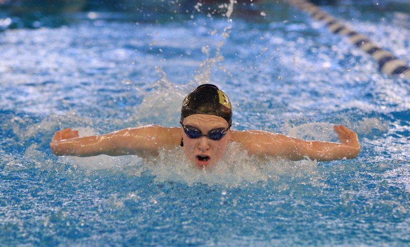 Taylor Pike of Bentonville competes in the girls 100-yard butterfly Thursday during the Bentonville January Classic swim meet at the Bentonville Community Center.