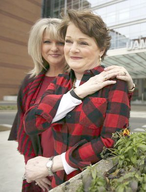 Arkansas Democrat-Gazette/MITCHELL PE MASILUN Tammy Hendren, left, and Bke Millwee, have a moment together Jan. 8 in front of UAMS in Little Rock.