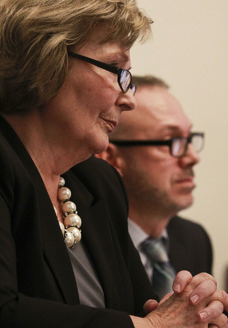 Sen. Cecile Bledsoe and Arkansas Medical Society counsel David Ivers answer questions Wednesday during a meeting of the Senate Committee on Public Health, Welfare and Labor about a Bledsoe-sponsored bill to create a law regulating telemedicine.