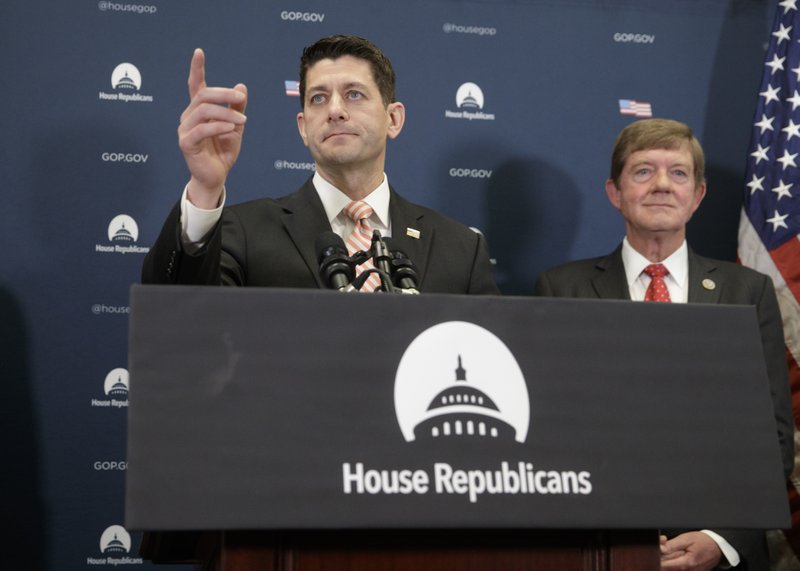 House Speaker Paul Ryan of Wis., joined by Rep. Scott Tipton, R-Colo., meets with reporters on Capitol Hill in Washington, Tuesday, Jan. 31, 2017, following GOP strategy session. Ryan gave a strong defense of President Donald Trump's refugee and immigration ban to caucus members and said he backs the order, which has created chaos and confusion worldwide. 