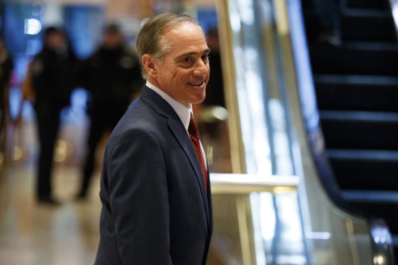 FILE - In this Jan. 9, 2017 file photo, Veterans Affair secretary nominee David Shulkin leaves a meeting at Trump Tower in New York.